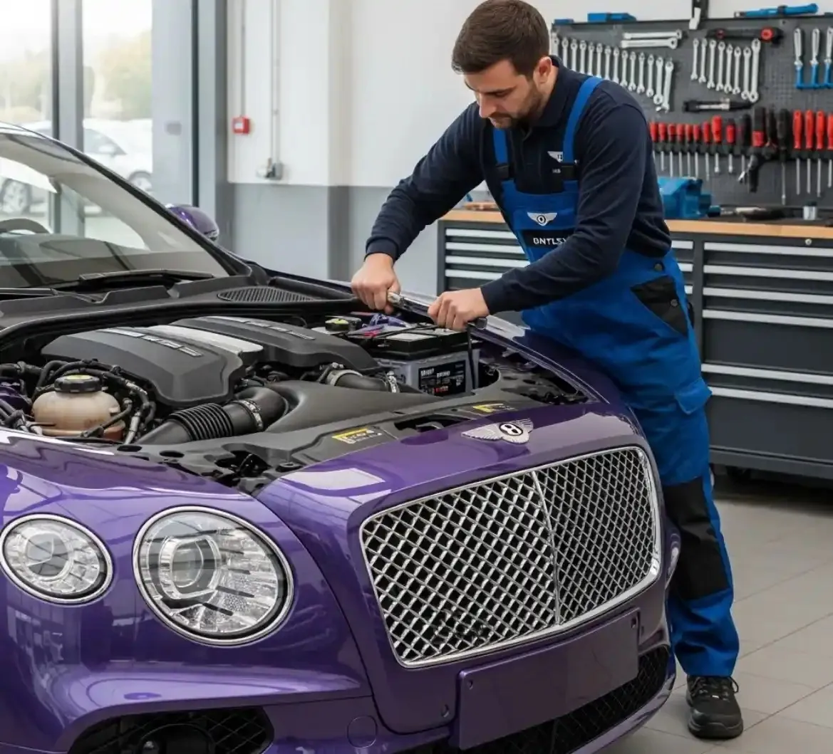 What Bentley owners get from us Technician working on a purple Bentley under the bonnet